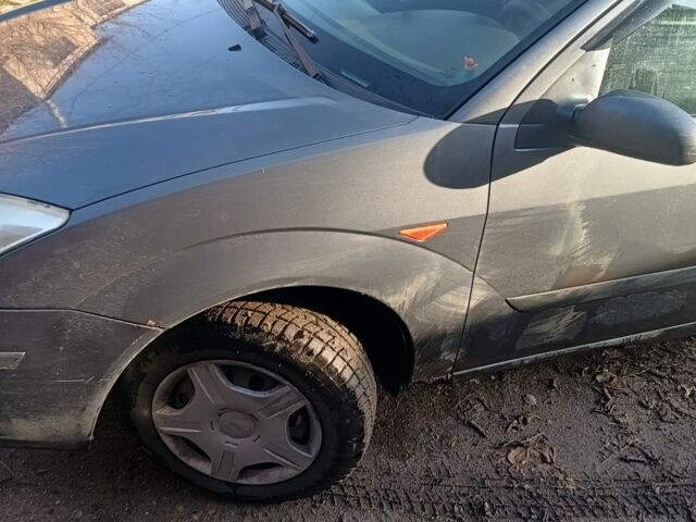 Серый Форд Фокус, объемом двигателя 1.6 л и пробегом 290 тыс. км за 1700 $, фото 7 на Automoto.ua