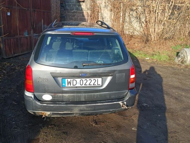 Серый Форд Фокус, объемом двигателя 1.6 л и пробегом 290 тыс. км за 1700 $, фото 4 на Automoto.ua
