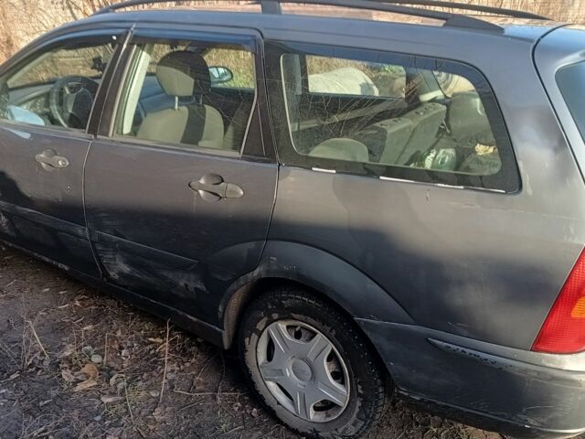 Серый Форд Фокус, объемом двигателя 1.6 л и пробегом 290 тыс. км за 1700 $, фото 3 на Automoto.ua