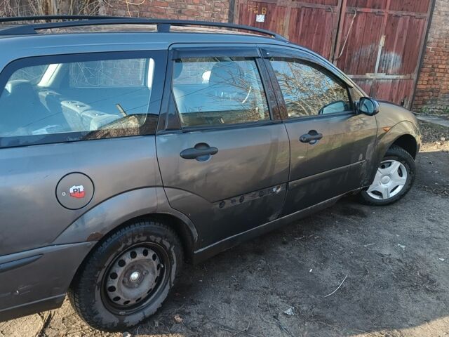 Серый Форд Фокус, объемом двигателя 1.6 л и пробегом 290 тыс. км за 1700 $, фото 1 на Automoto.ua