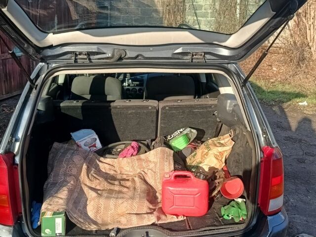 Серый Форд Фокус, объемом двигателя 1.6 л и пробегом 290 тыс. км за 1700 $, фото 10 на Automoto.ua