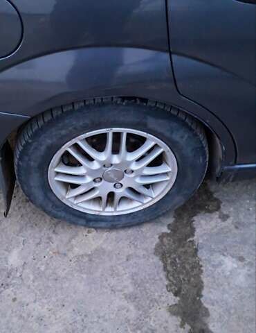 Серый Форд Фокус, объемом двигателя 1.8 л и пробегом 336 тыс. км за 3950 $, фото 18 на Automoto.ua