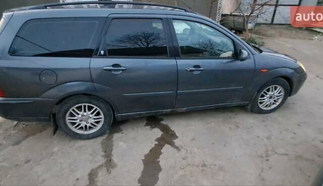 Серый Форд Фокус, объемом двигателя 1.8 л и пробегом 336 тыс. км за 3950 $, фото 12 на Automoto.ua