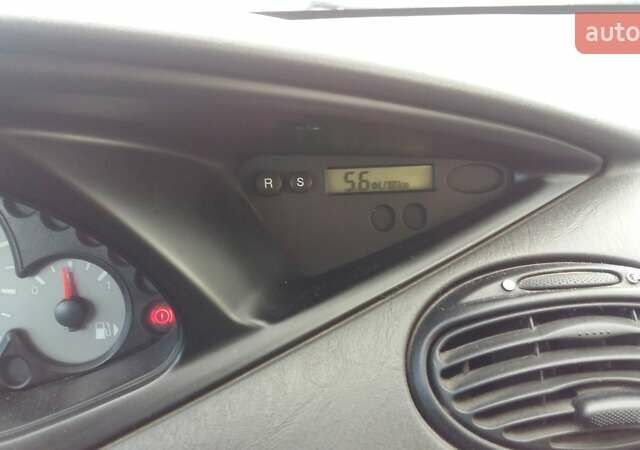 Серый Форд Фокус, объемом двигателя 1.8 л и пробегом 245 тыс. км за 4500 $, фото 20 на Automoto.ua