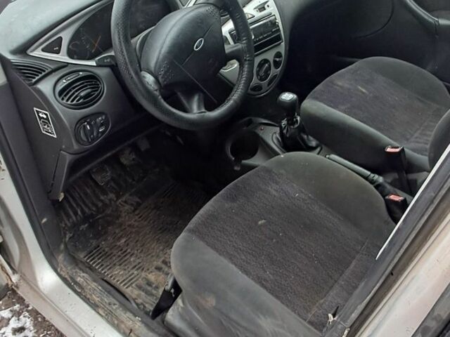 Серый Форд Фокус, объемом двигателя 1.8 л и пробегом 240 тыс. км за 1350 $, фото 5 на Automoto.ua