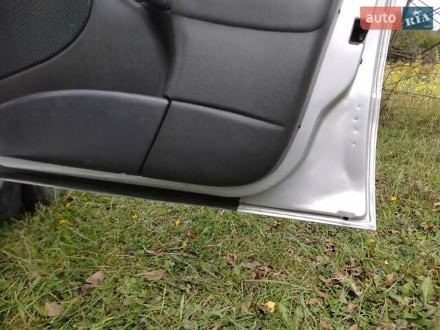 Серый Форд Фокус, объемом двигателя 1.8 л и пробегом 245 тыс. км за 4500 $, фото 31 на Automoto.ua