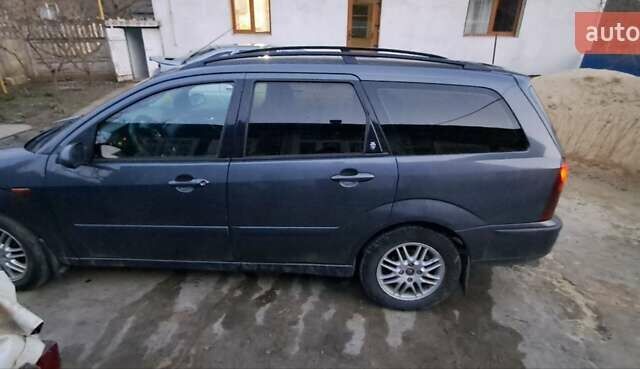 Серый Форд Фокус, объемом двигателя 1.8 л и пробегом 336 тыс. км за 3950 $, фото 13 на Automoto.ua