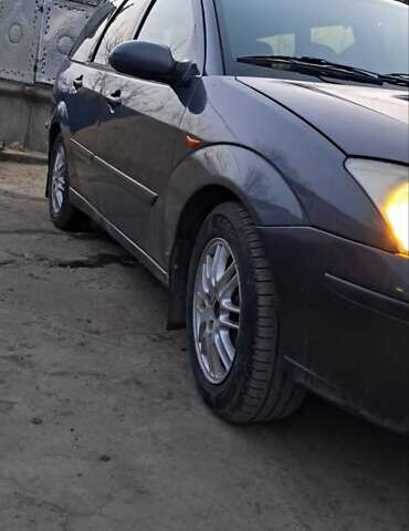 Серый Форд Фокус, объемом двигателя 1.8 л и пробегом 336 тыс. км за 3950 $, фото 16 на Automoto.ua