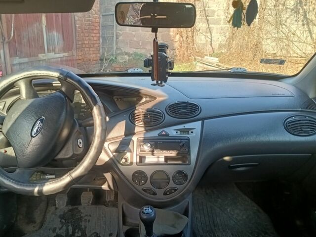 Серый Форд Фокус, объемом двигателя 1.6 л и пробегом 290 тыс. км за 1700 $, фото 6 на Automoto.ua