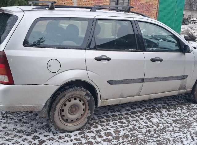 Серый Форд Фокус, объемом двигателя 1.8 л и пробегом 240 тыс. км за 1350 $, фото 3 на Automoto.ua