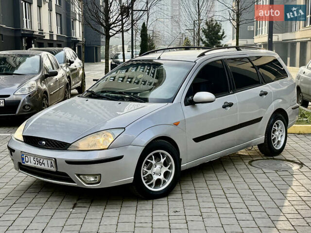 Серый Форд Фокус, объемом двигателя 1.8 л и пробегом 290 тыс. км за 2850 $, фото 7 на Automoto.ua
