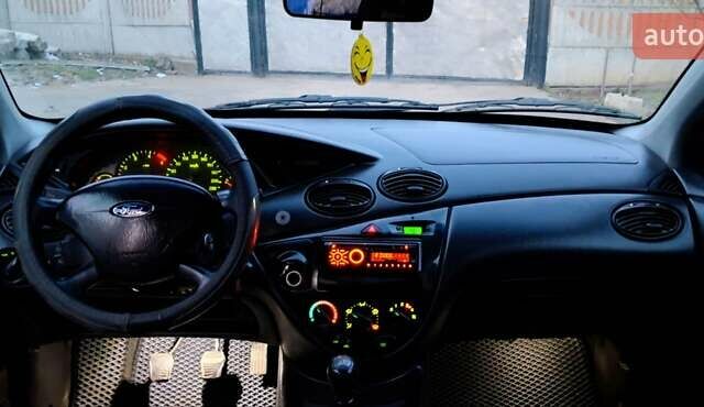 Серый Форд Фокус, объемом двигателя 1.8 л и пробегом 336 тыс. км за 3950 $, фото 8 на Automoto.ua