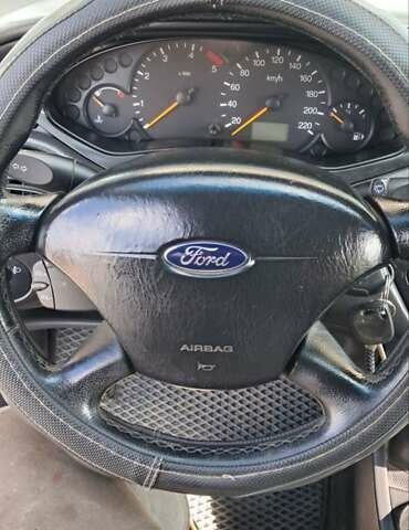 Серый Форд Фокус, объемом двигателя 1.8 л и пробегом 336 тыс. км за 3950 $, фото 25 на Automoto.ua