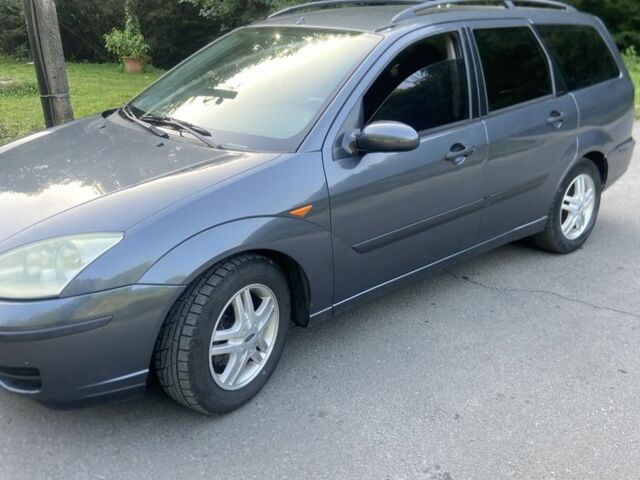 Серый Форд Фокус, объемом двигателя 1.6 л и пробегом 277 тыс. км за 2950 $, фото 4 на Automoto.ua