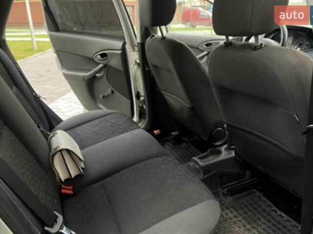 Серый Форд Фокус, объемом двигателя 1.8 л и пробегом 290 тыс. км за 2850 $, фото 18 на Automoto.ua