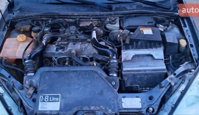 Серый Форд Фокус, объемом двигателя 1.8 л и пробегом 336 тыс. км за 3950 $, фото 6 на Automoto.ua