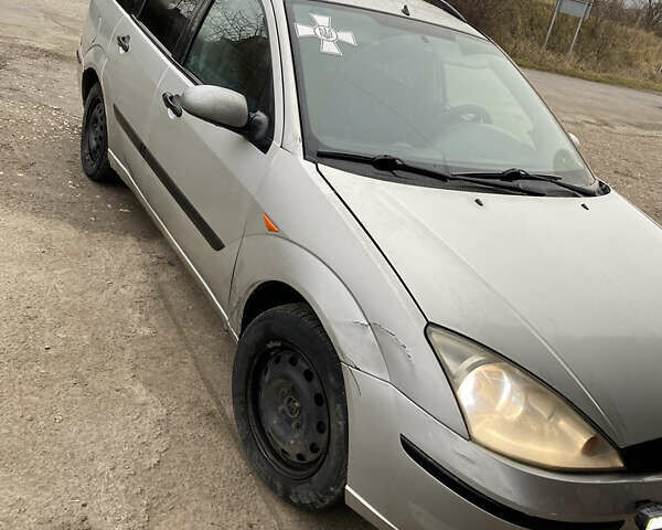 Серый Форд Фокус, объемом двигателя 1.8 л и пробегом 350 тыс. км за 1300 $, фото 2 на Automoto.ua