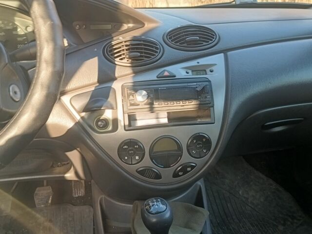 Серый Форд Фокус, объемом двигателя 1.6 л и пробегом 290 тыс. км за 1700 $, фото 5 на Automoto.ua