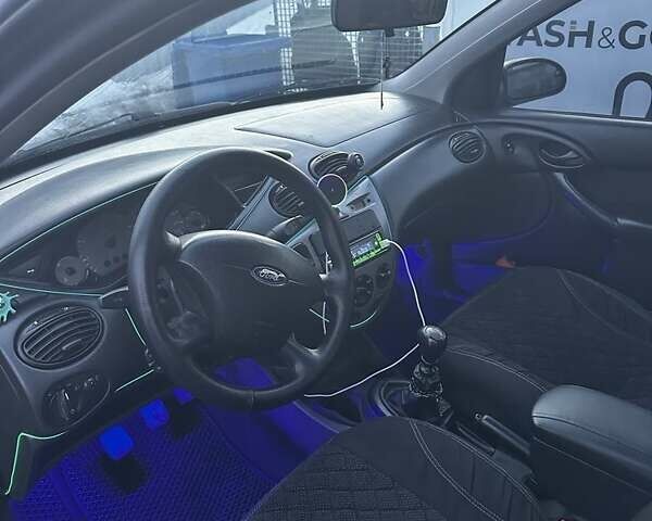 Серый Форд Фокус, объемом двигателя 1.8 л и пробегом 300 тыс. км за 2500 $, фото 4 на Automoto.ua