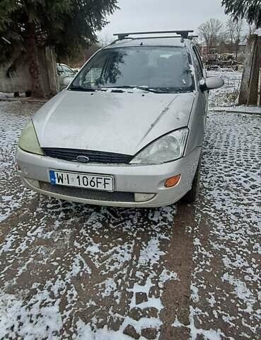 Серый Форд Фокус, объемом двигателя 1.8 л и пробегом 240 тыс. км за 1350 $, фото 1 на Automoto.ua