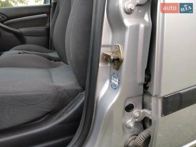 Серый Форд Фокус, объемом двигателя 1.8 л и пробегом 245 тыс. км за 4500 $, фото 29 на Automoto.ua