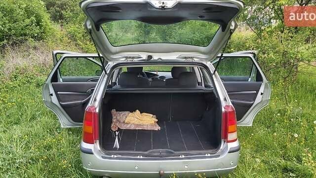 Серый Форд Фокус, объемом двигателя 1.8 л и пробегом 245 тыс. км за 4500 $, фото 25 на Automoto.ua