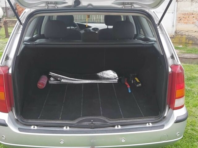 Сірий Форд Фокус, об'ємом двигуна 1.8 л та пробігом 245 тис. км за 4500 $, фото 13 на Automoto.ua