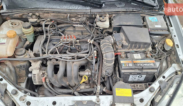 Серый Форд Фокус, объемом двигателя 1.6 л и пробегом 233 тыс. км за 3700 $, фото 12 на Automoto.ua