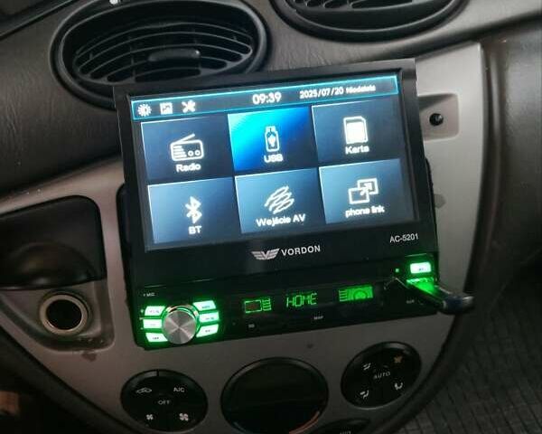 Серый Форд Фокус, объемом двигателя 1.6 л и пробегом 231 тыс. км за 4900 $, фото 20 на Automoto.ua