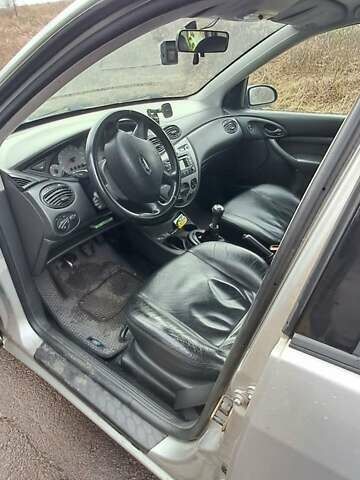 Серый Форд Фокус, объемом двигателя 1.6 л и пробегом 251 тыс. км за 3950 $, фото 7 на Automoto.ua