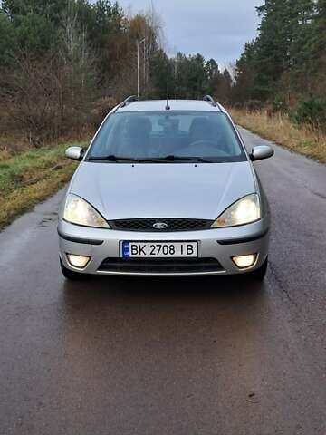 Серый Форд Фокус, объемом двигателя 1.6 л и пробегом 251 тыс. км за 3950 $, фото 6 на Automoto.ua