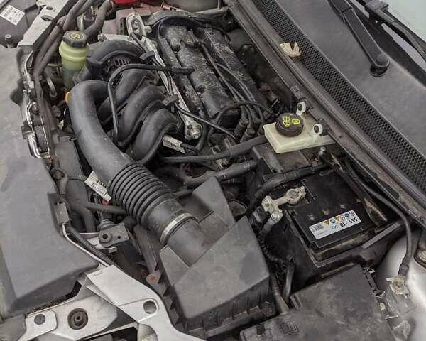 Серый Форд Фокус, объемом двигателя 1.6 л и пробегом 137 тыс. км за 4800 $, фото 5 на Automoto.ua