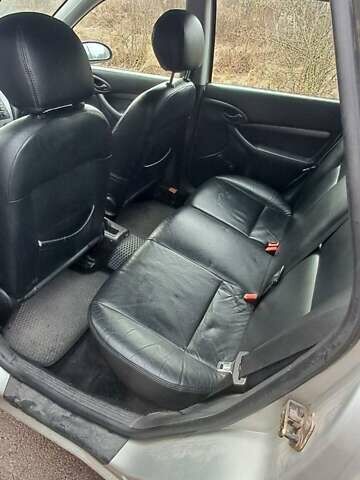 Серый Форд Фокус, объемом двигателя 1.6 л и пробегом 251 тыс. км за 3950 $, фото 8 на Automoto.ua