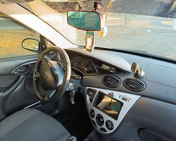 Серый Форд Фокус, объемом двигателя 1.6 л и пробегом 500 тыс. км за 3800 $, фото 11 на Automoto.ua