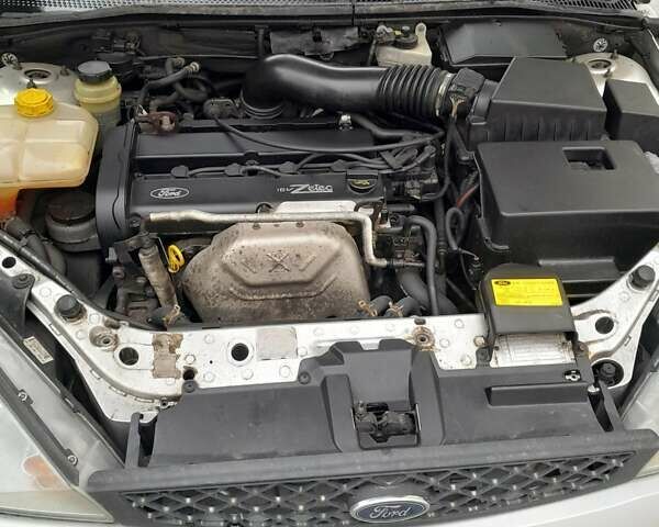 Серый Форд Фокус, объемом двигателя 1.8 л и пробегом 195 тыс. км за 4250 $, фото 5 на Automoto.ua