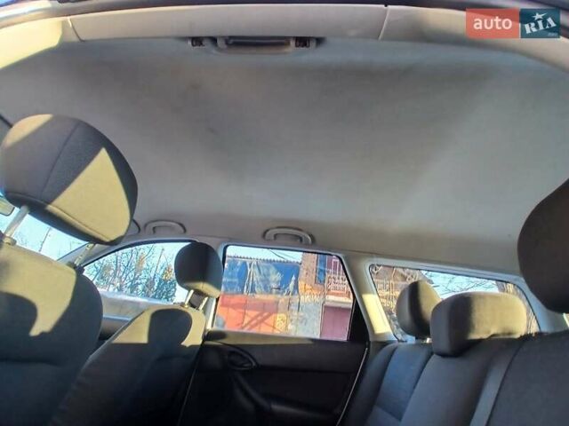 Сірий Форд Фокус, об'ємом двигуна 1.8 л та пробігом 213 тис. км за 4100 $, фото 91 на Automoto.ua