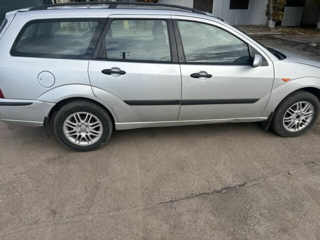 Серый Форд Фокус, объемом двигателя 1.8 л и пробегом 400 тыс. км за 1500 $, фото 2 на Automoto.ua