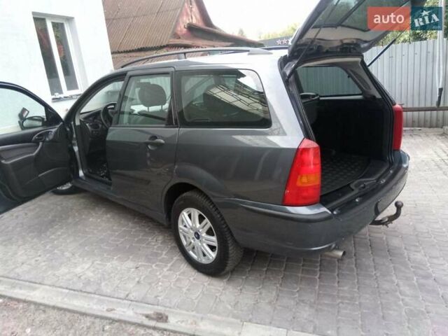 Серый Форд Фокус, объемом двигателя 1.6 л и пробегом 231 тыс. км за 4900 $, фото 26 на Automoto.ua