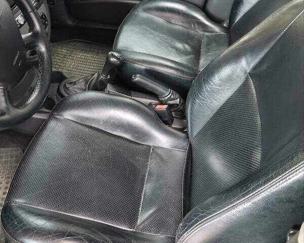 Серый Форд Фокус, объемом двигателя 1.6 л и пробегом 231 тыс. км за 4900 $, фото 25 на Automoto.ua