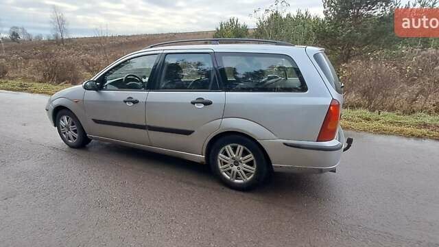 Серый Форд Фокус, объемом двигателя 1.6 л и пробегом 251 тыс. км за 3950 $, фото 4 на Automoto.ua