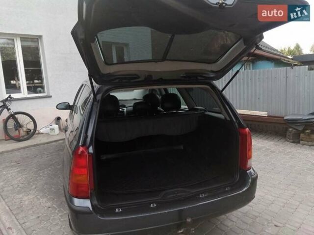 Серый Форд Фокус, объемом двигателя 1.6 л и пробегом 231 тыс. км за 4900 $, фото 6 на Automoto.ua