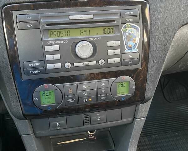 Серый Форд Фокус, объемом двигателя 1.6 л и пробегом 220 тыс. км за 4500 $, фото 11 на Automoto.ua