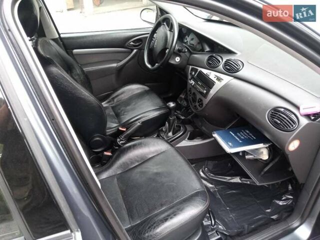 Серый Форд Фокус, объемом двигателя 1.6 л и пробегом 231 тыс. км за 4900 $, фото 12 на Automoto.ua