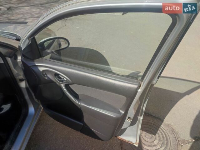 Серый Форд Фокус, объемом двигателя 1.8 л и пробегом 344 тыс. км за 2300 $, фото 22 на Automoto.ua