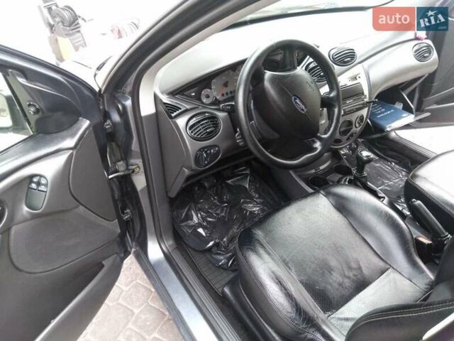 Серый Форд Фокус, объемом двигателя 1.6 л и пробегом 231 тыс. км за 4900 $, фото 2 на Automoto.ua