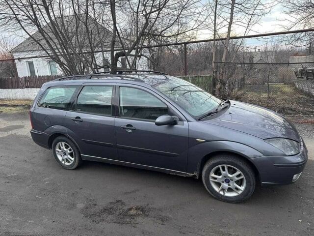 Серый Форд Фокус, объемом двигателя 1.8 л и пробегом 329 тыс. км за 3400 $, фото 2 на Automoto.ua