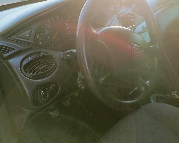 Серый Форд Фокус, объемом двигателя 1.6 л и пробегом 500 тыс. км за 3800 $, фото 18 на Automoto.ua