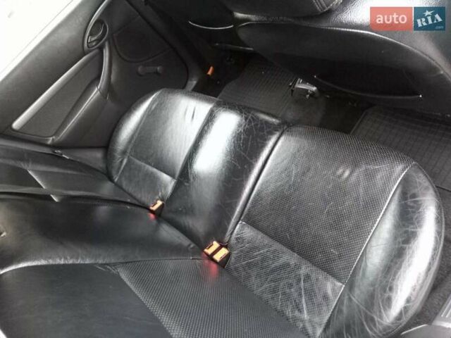 Серый Форд Фокус, объемом двигателя 1.6 л и пробегом 231 тыс. км за 4900 $, фото 3 на Automoto.ua