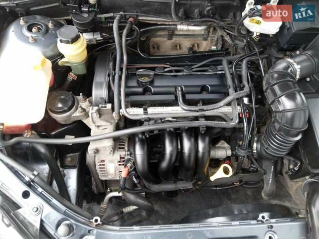 Серый Форд Фокус, объемом двигателя 1.6 л и пробегом 231 тыс. км за 4900 $, фото 4 на Automoto.ua