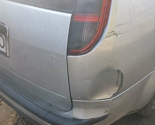 Серый Форд Фокус, объемом двигателя 1.56 л и пробегом 300 тыс. км за 3200 $, фото 1 на Automoto.ua